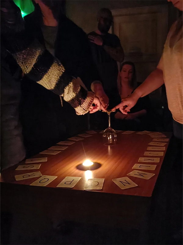 Séance circle gathered around table