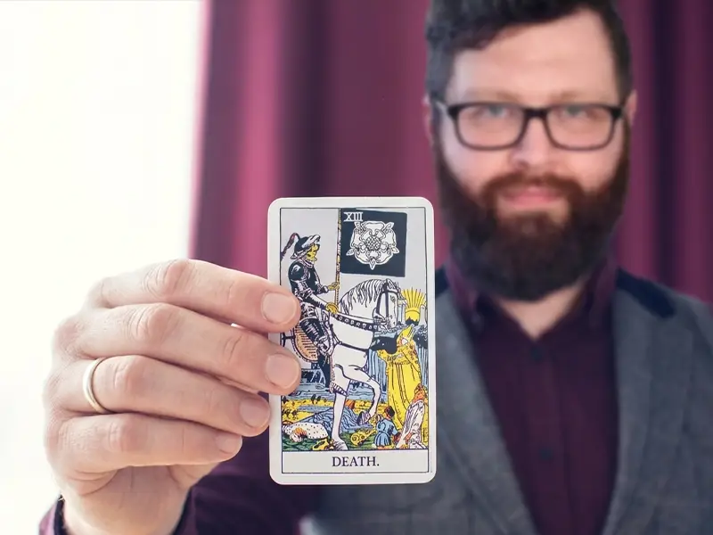Tarot cards laid out on an atmospheric platform reading table